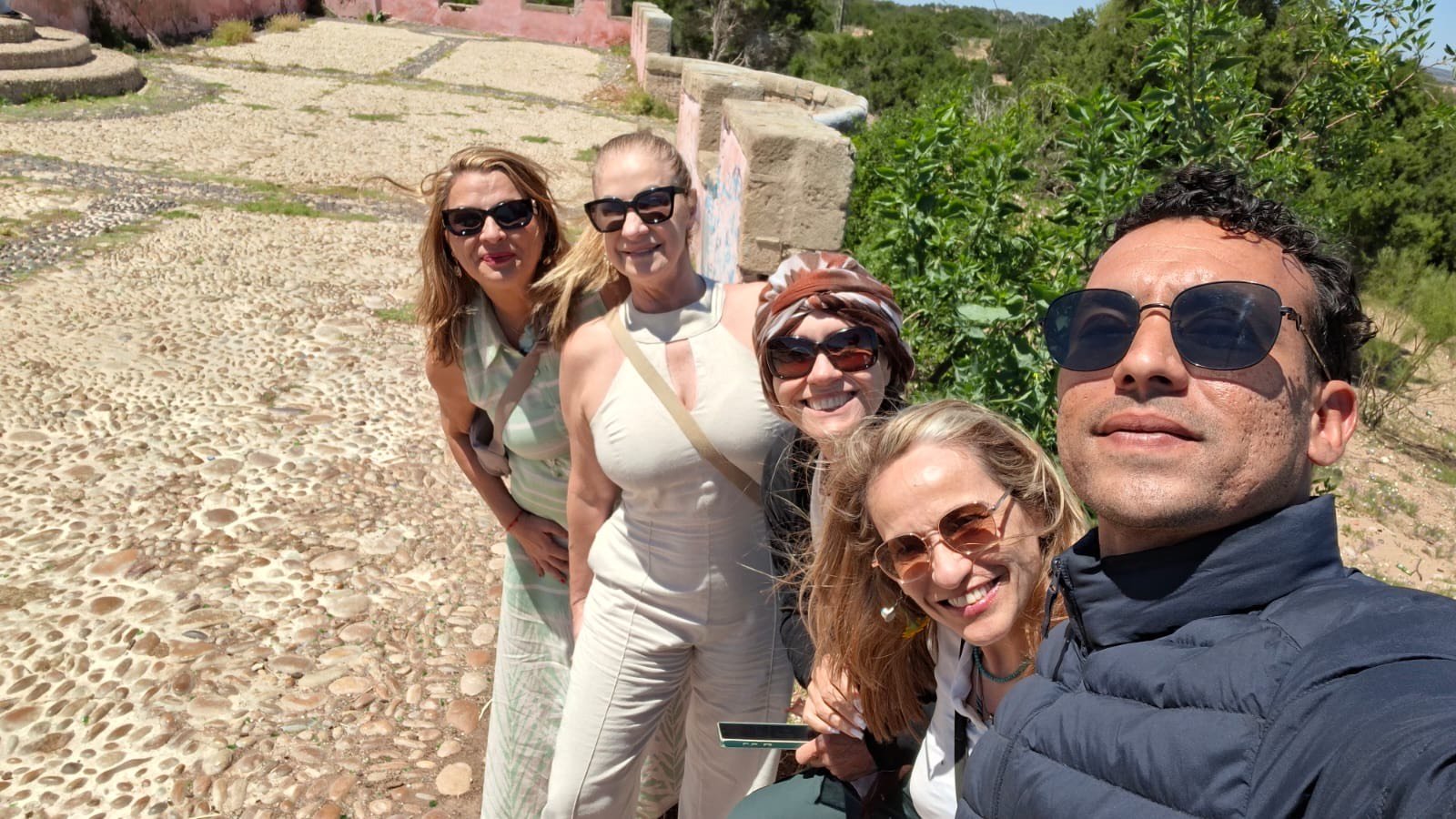 Morocco desert tours - travelers enjoying local experience in Morocco